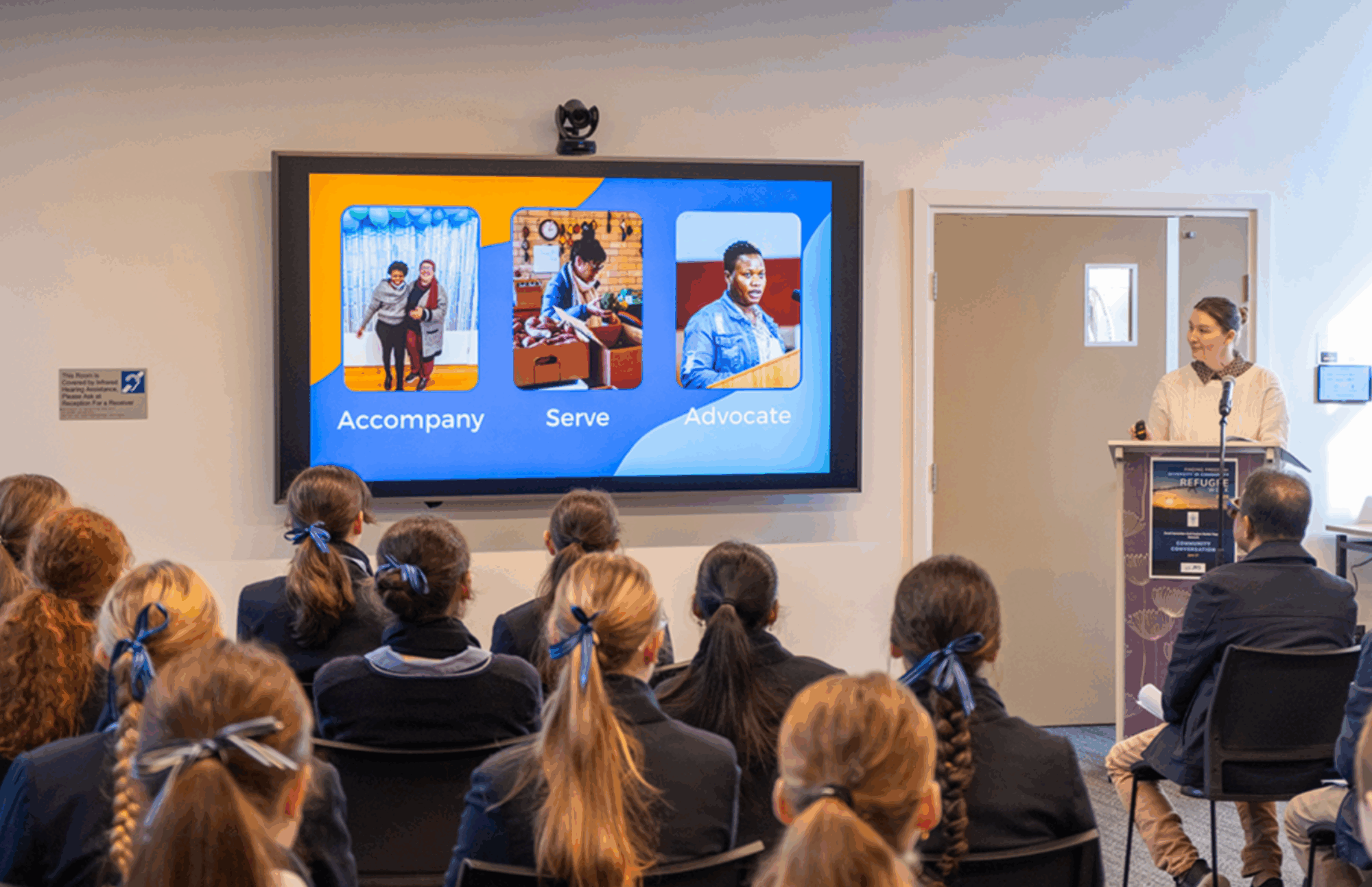 Amelia Savage, JRS Australia's Head of Policy, Advocacy and Communications, speaking for a Sisters of the Good Samaritan Refugee Week event at St Scholastica's College in Glebe on 17 June 2025. Credit: Sisters of the Good Samaritan